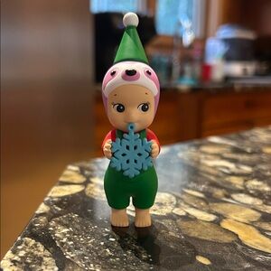 Santa’s little helper sloth sonny angel